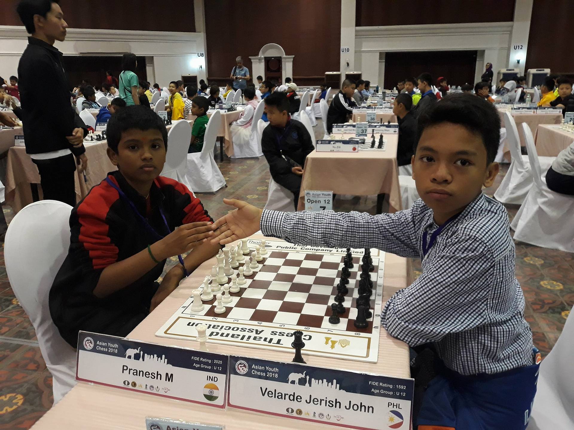  Pranesh M of India (left) versus Jerish John Velarde of Lapu-Lapu City, Cebu, Philippines (right) during the Round 4 of the Asian Youth Chess Championships Standard event on Wednesday at the Lotus Pang Suan Kaew Hotel in Chiang Mai, Thailand. DAVAO BET FM JOHN MARVIN MICIANO STILL ON TOP